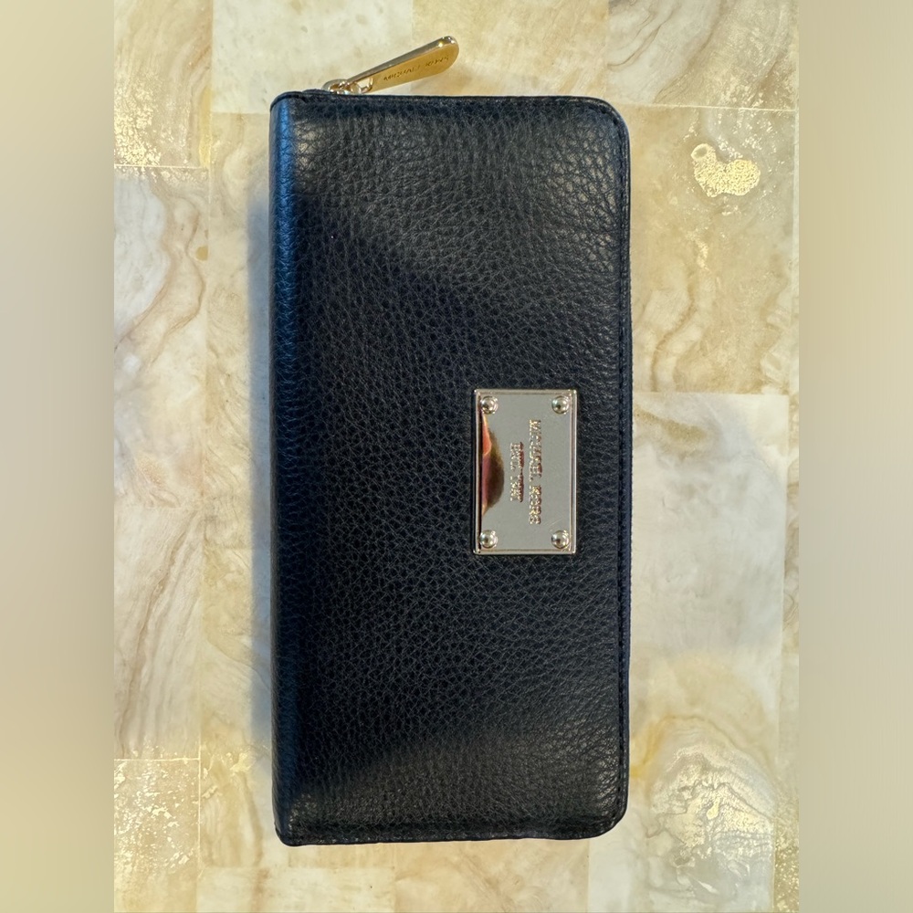 One women’s Michael Kors black wallet